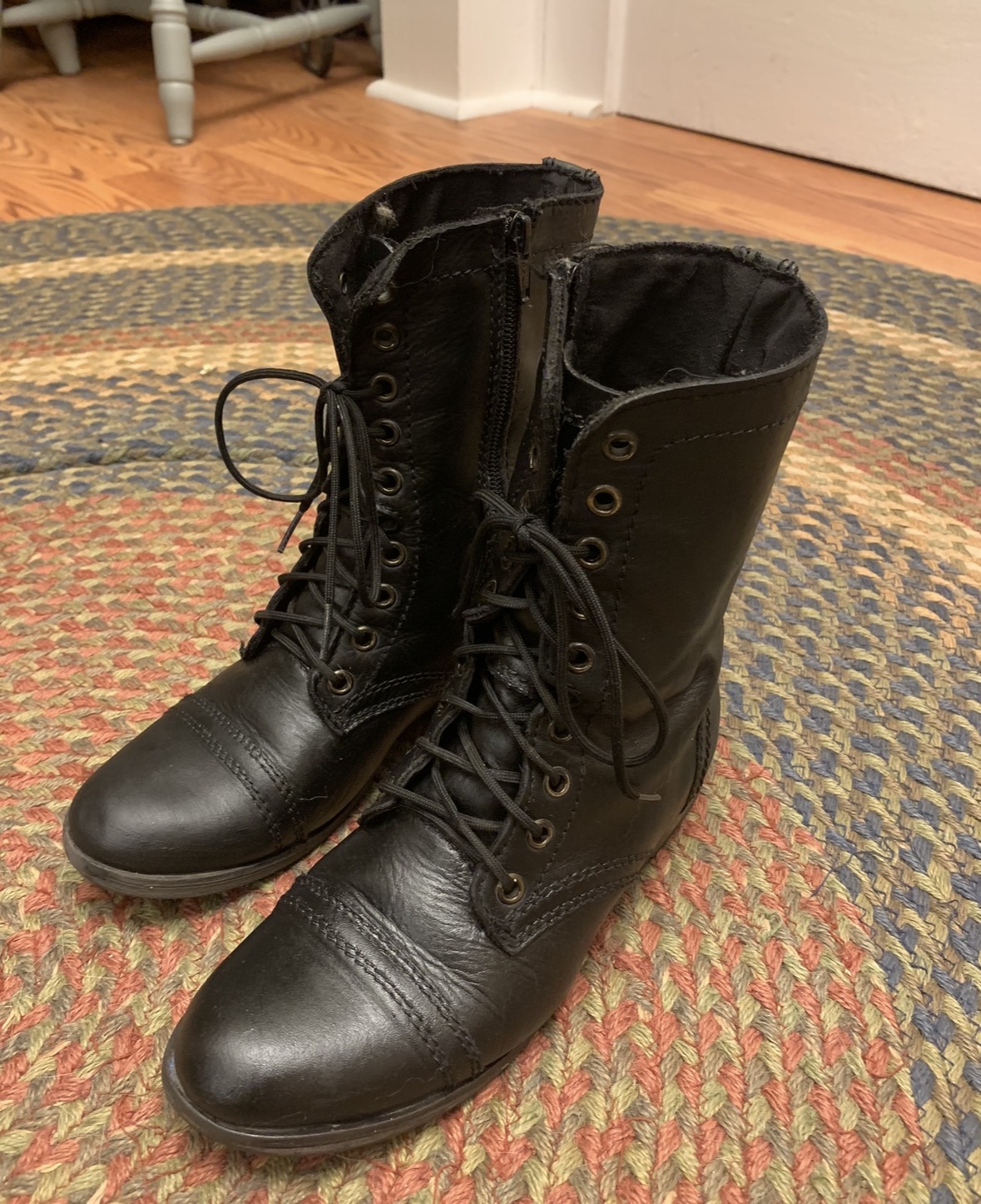 Same black leather boots after careful cleaning and recolouring